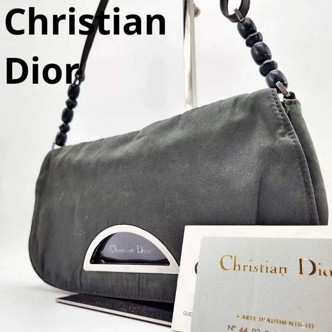 Pochette accessoire Christian Dior malice perle nylon mousse vert authentifiée OCCASION