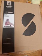 women size 10 ice skates, STORY, white with pink decor, extra insulation.