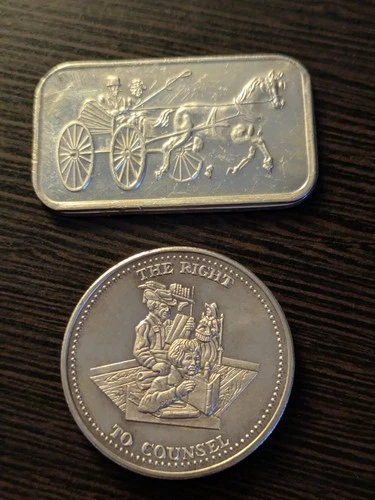 2 oz. of pure 0.999 Silver Bullion (1 Round & 1 Bar)