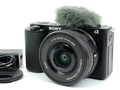 Sony ZV-E10 Spiegellose Kamera Schwarz Objektiv 16-50mm 33 Sprache...