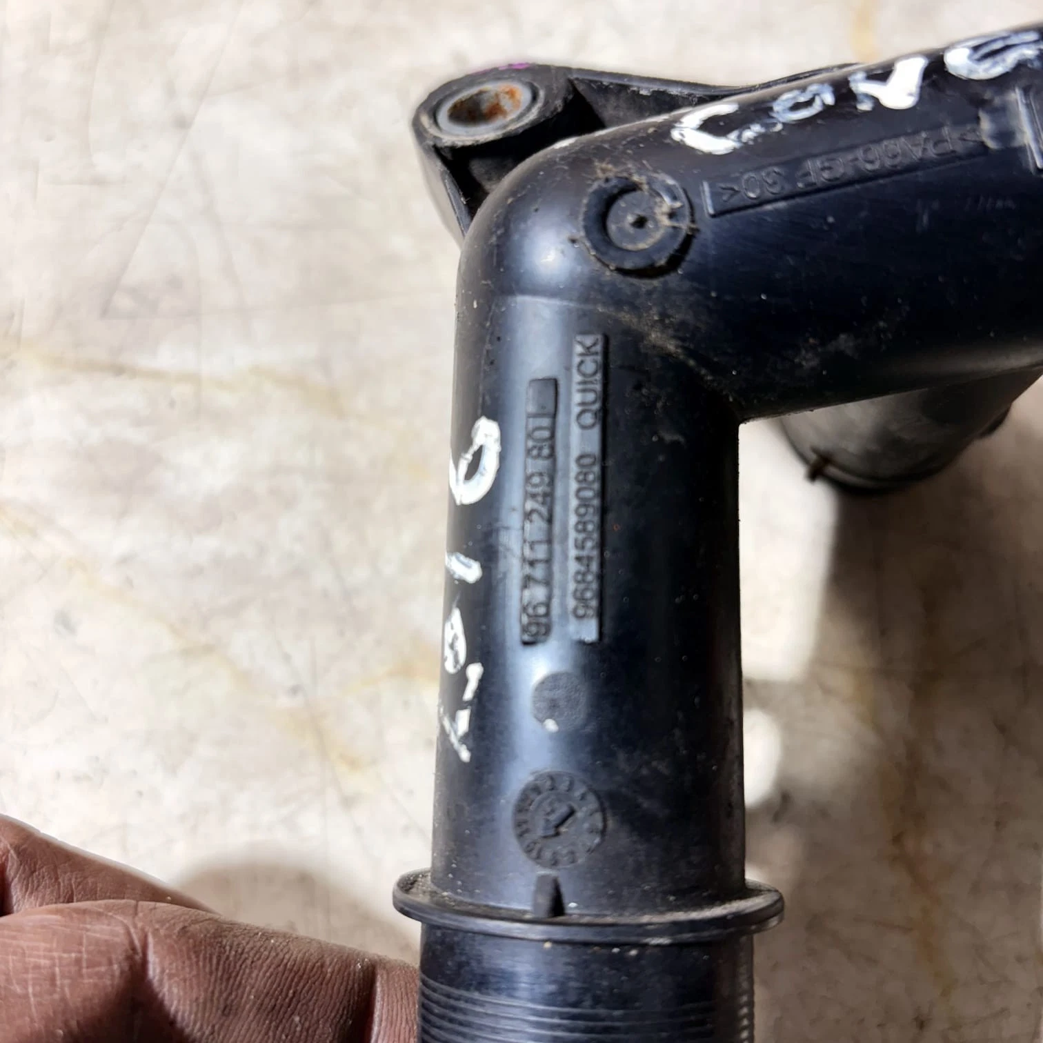 Close-up of coolant pipe moulding part numbers