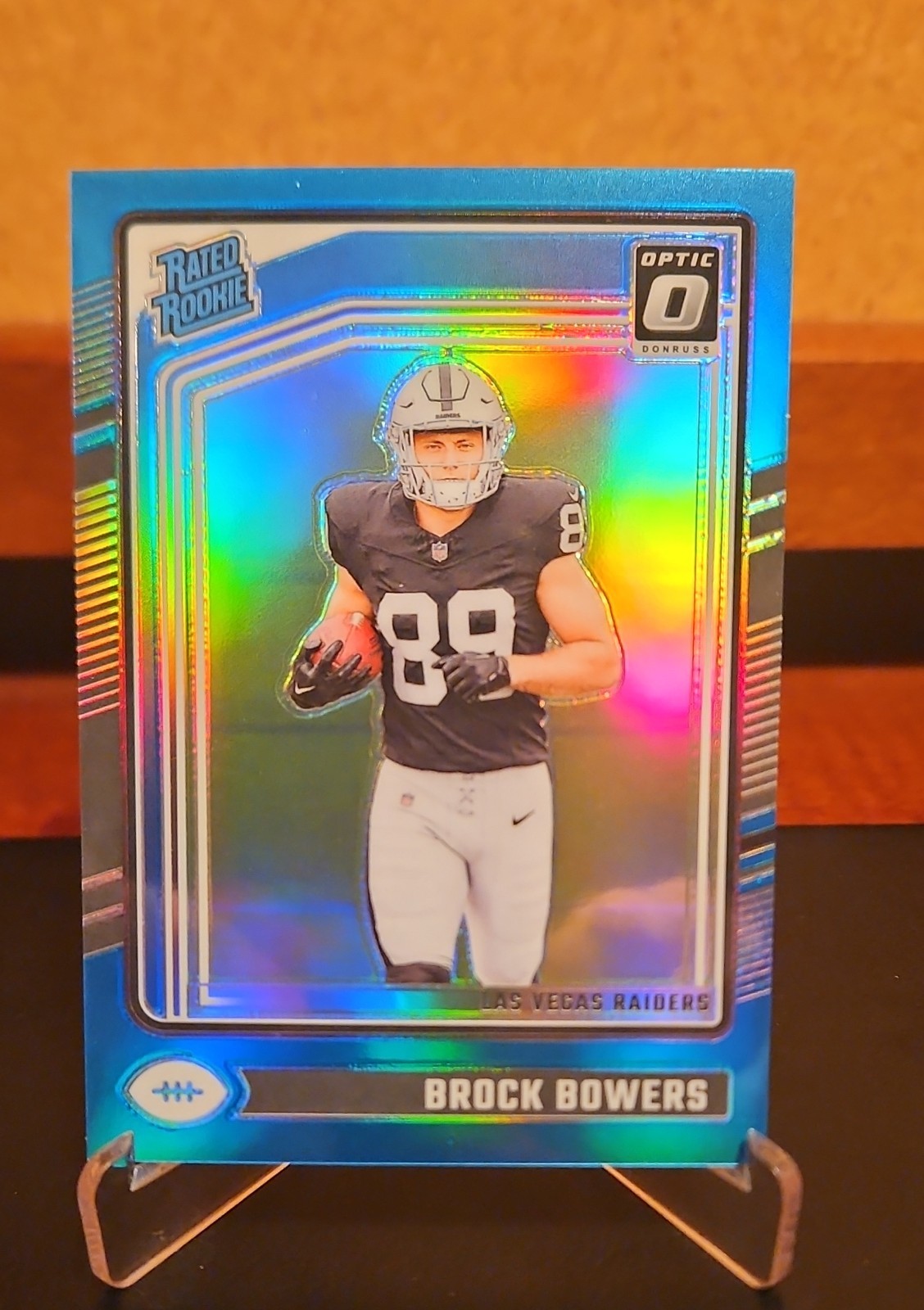 2024 Panini Donruss Optic - Rated Rookie Brock Bowers #215 Aqua Prizm /299 (RC)