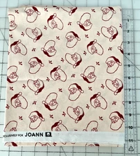 Joann Fabrics Scattered Santas Red on Creamy Beige Cotton   1 Yd x 43"