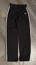 Woman  s Adidas  Firebird Pants Black white stripes toggle ankle