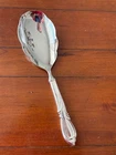 MINT LARGE INTERNATIONAL STERLING SILVER NEW RHAPSODY RICE SERVING SPOON