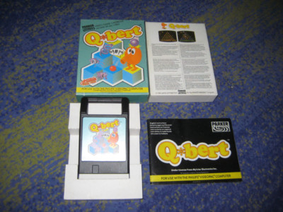 Philips: A boxed Phillips Videopac G7000 computer with seven games cartridges. Computer console, with all chargers