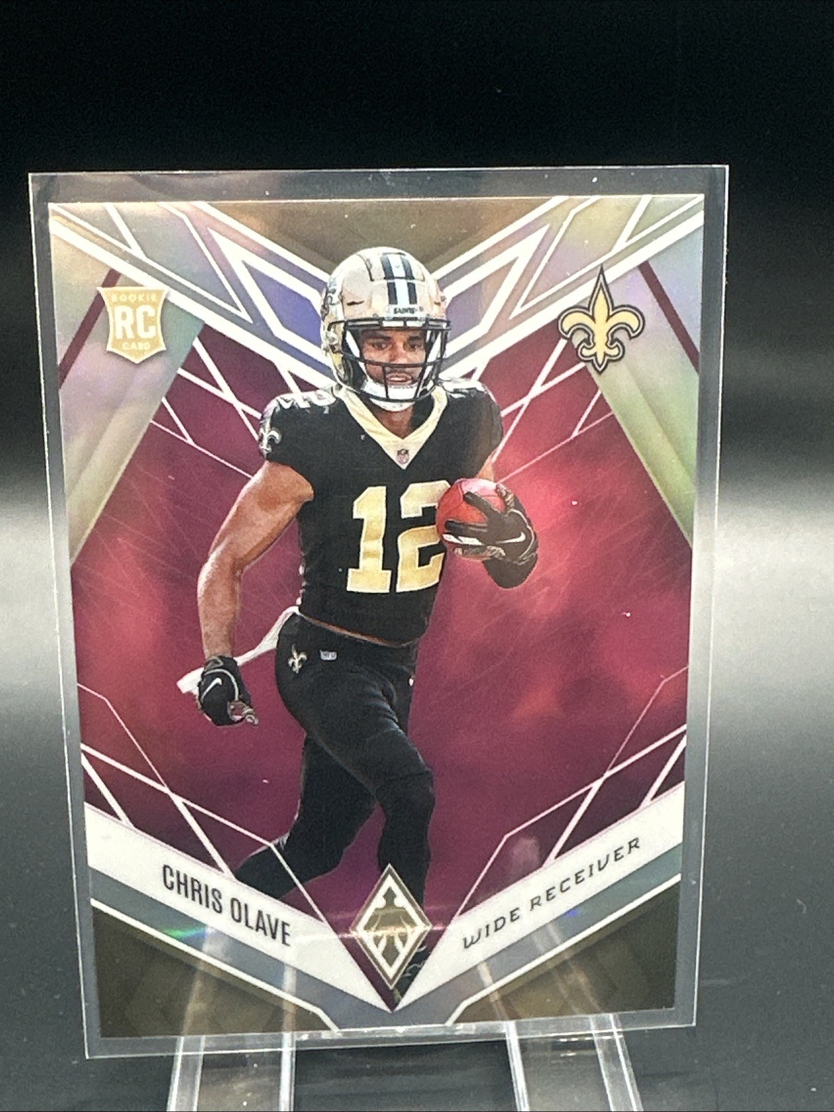 2022 Panini Phoenix - Rookies Chris Olave #109 Pink /199 (RC)