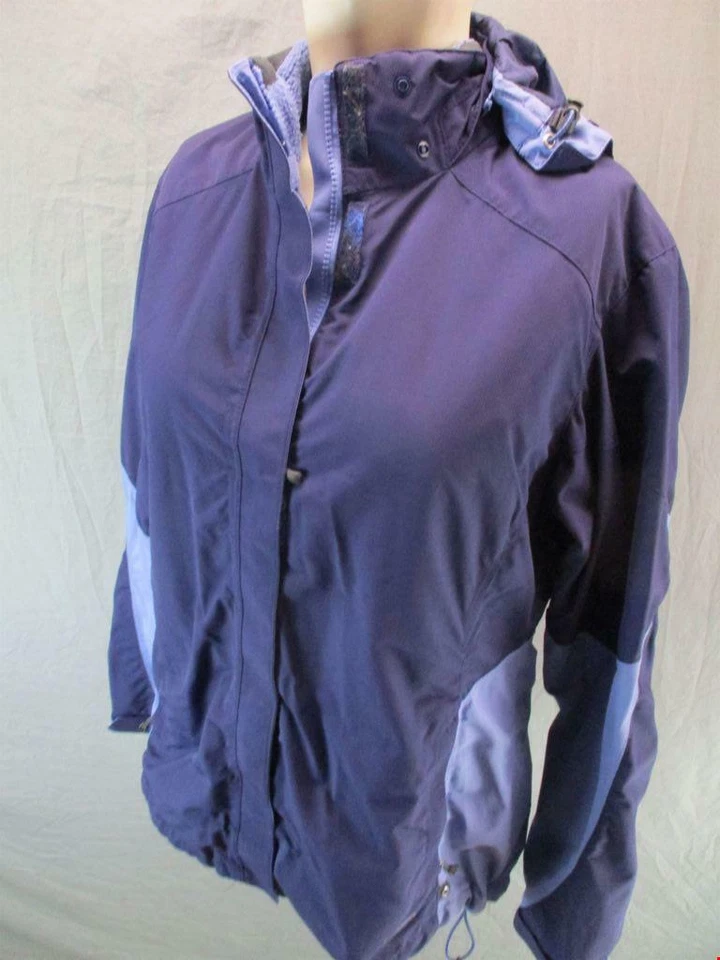 Chaqueta acolchada a prueba de viento con capucha forrada de vellón Sherpa azul talla M REI para mujer GR6245 Foto 3 de 4