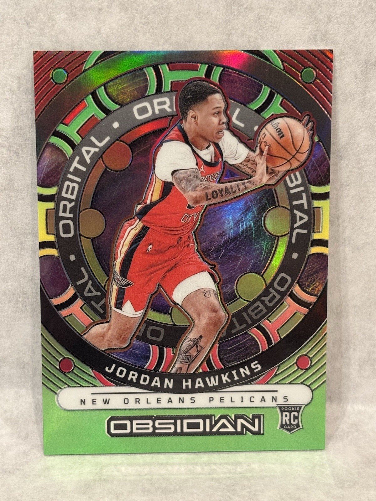 2023-24 Panini Obsidian - Jordan Hawkins Orbital Reggae Flood /60 #24 (RC)