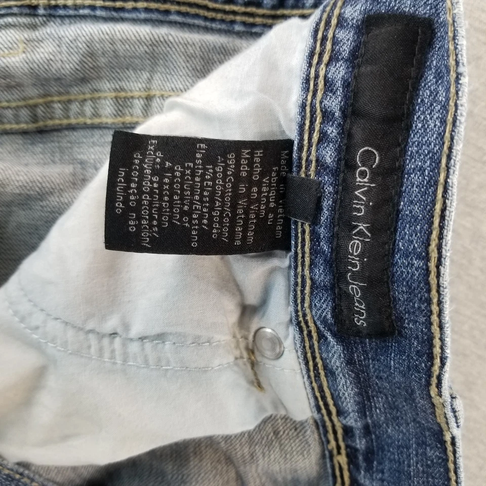 Pantalones de mezclilla para hombre Calvin Klein talla 36 de colección ajustados lavado medio 99 % algodón Normcore duraderos Foto 4 de 4