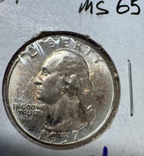 1957 25C Washington Quarter. BU luster and toning are amazing in hand.