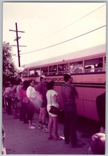 Vtg Color Snapshot Group People Waiting In Line By Pink Transporta Bus 1980s