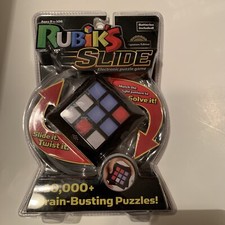 Rubiks Slide Electronic Game 10,000 Brain Busting Puzzles Cube. Factory Sealed 