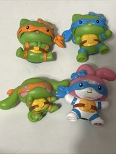 Lot of 4 McDonalds Hello Kitty Teenage Mutant Ninja Turtles TMNT Happy Meal Toys