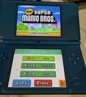 Nintendo DSI XL Midnight Blue Handheld Game Console with 11 games, case &charger — photo 7