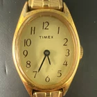 Timex Quartz Women's Oval Gold Tone Expansion Bracelet White Dial Arabic 18mm