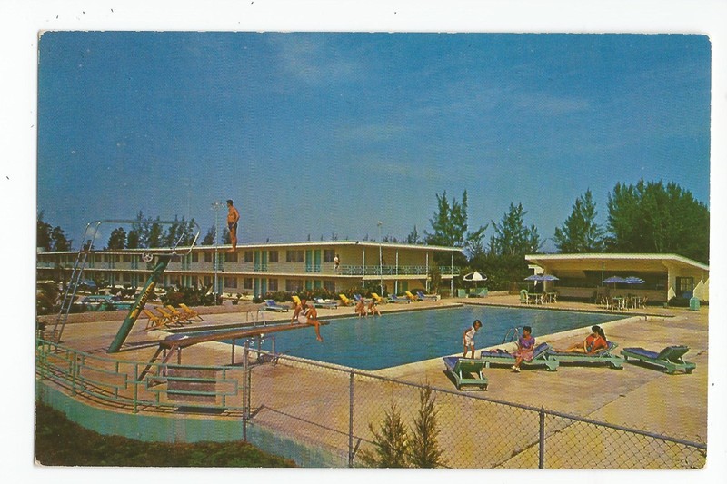 Postcard: Starlite Motel, Cocoa Beach, Florida - pool scene; Roadside America