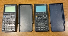 Texas Instruments Calcultor Lot of 2 TI-82, TI-85 Both Work for Parts