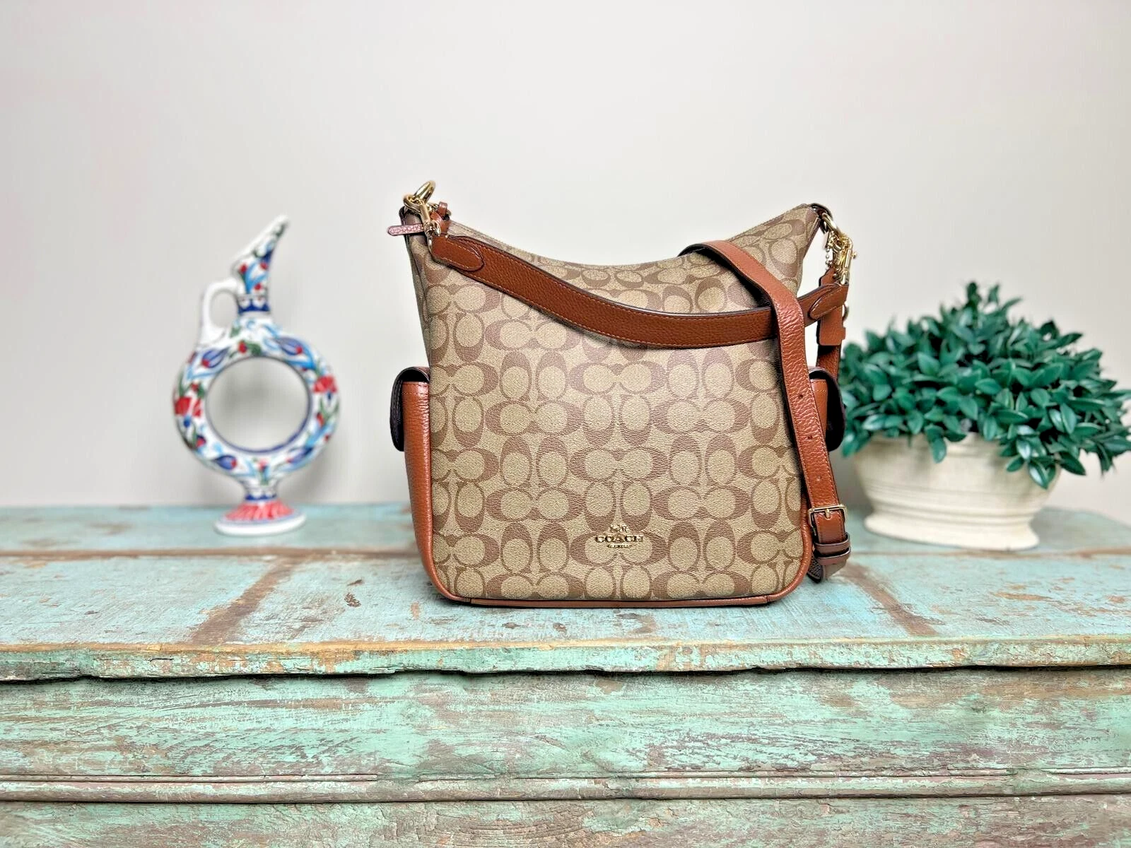 Coach (C1523) Borsa a tracolla Pennie Khaki Redwood firmata tela rivestita