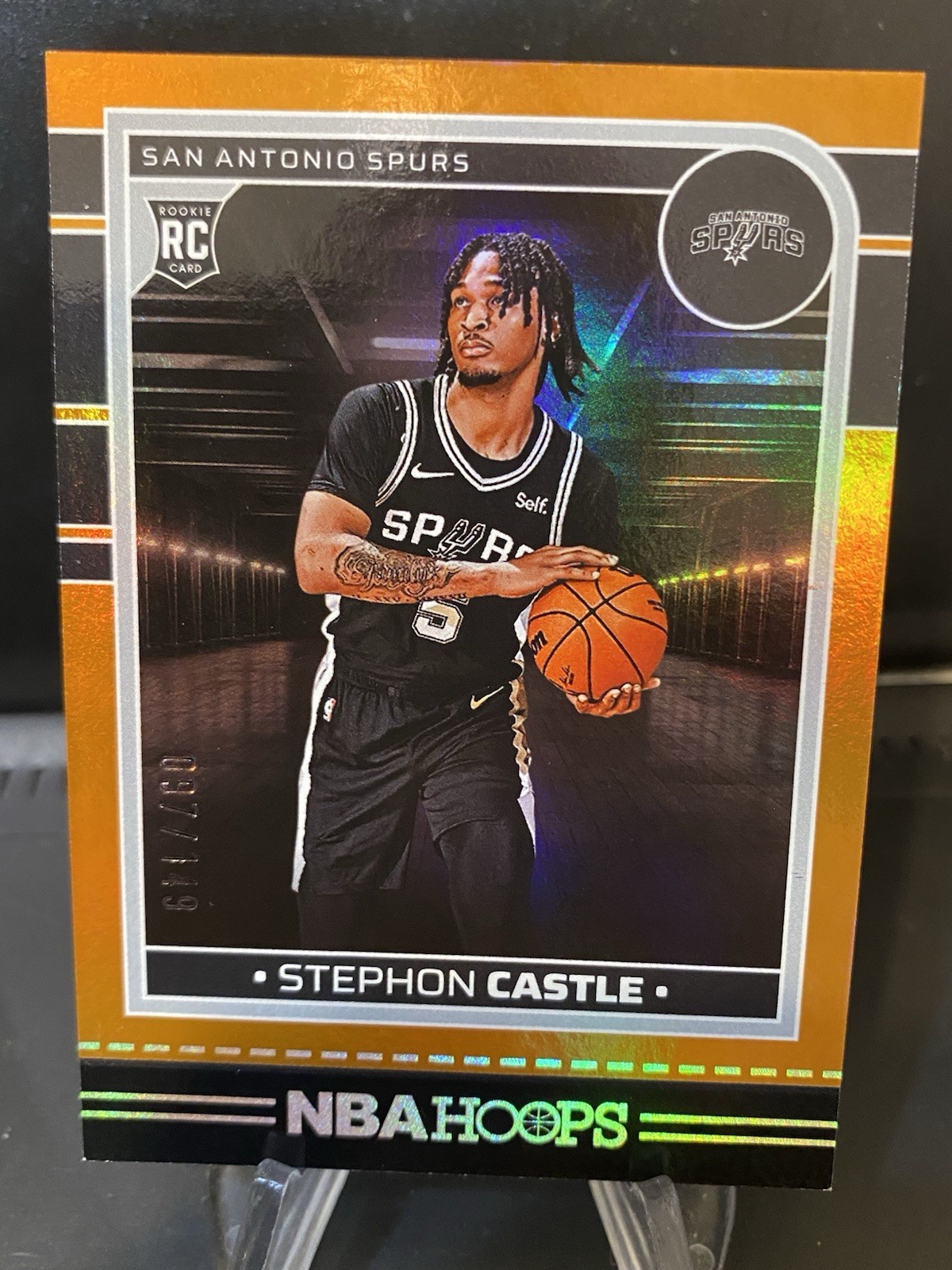 2024-25 NBA Hoops Orange #234 Stephon Castle RC - /149 - San Antonio Spurs