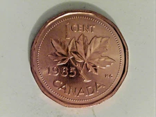 1985 Canadian Penny. Pointed 5. Some Spots or Stains.