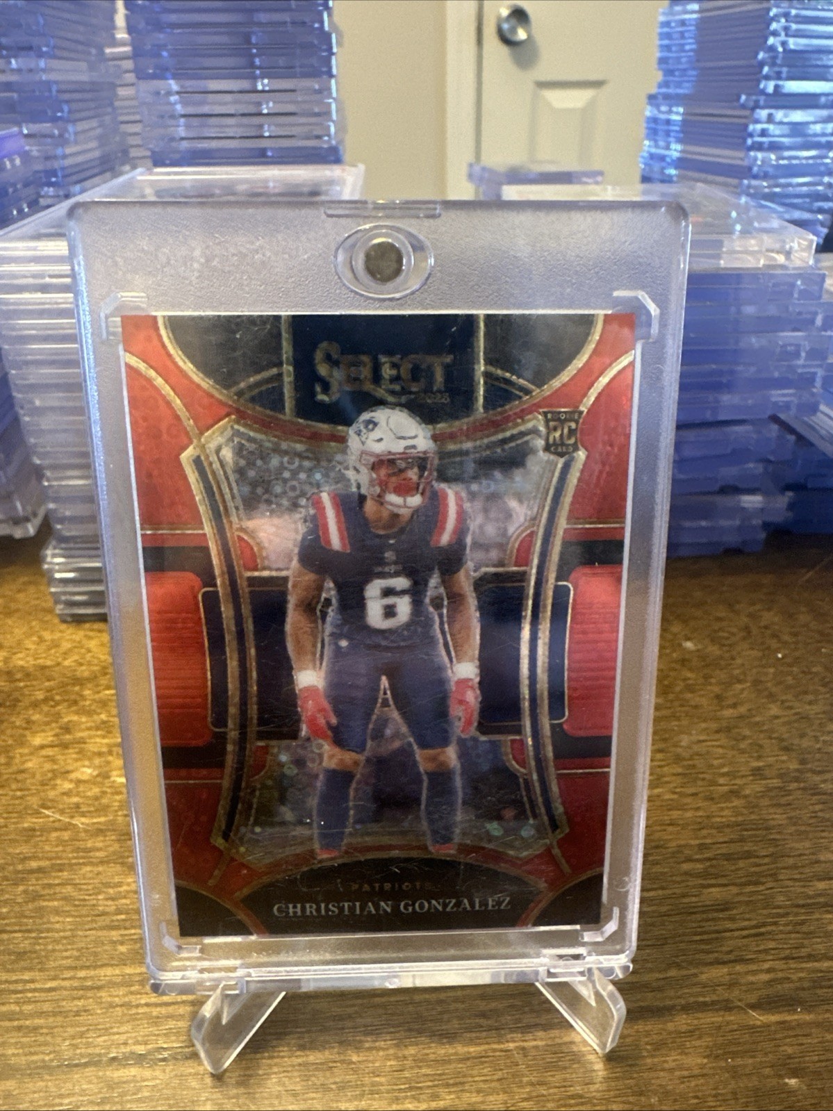2023 Panini Select - Suite Level Christian Gonzalez #464 Red Prizm /49 (RC)