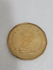 VTG  1987 ELIZABETH 11 D.G.REGINA GOLD COLOR 0NE DOLLAR COIN UNCERTIFIED...