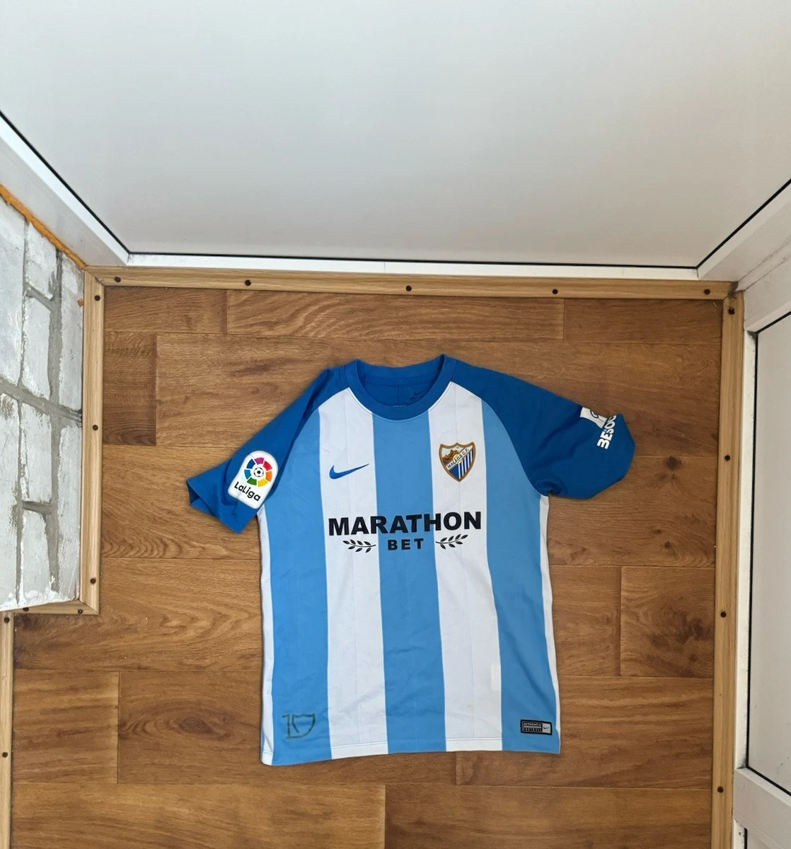 Nike Malaga International Club Soccer Fan Apparel and Souvenirs