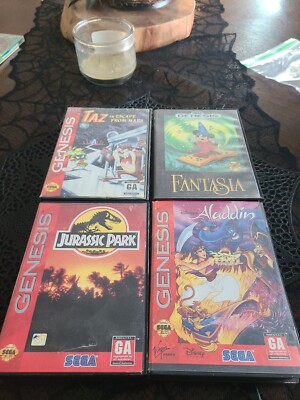 Lot of 4 Sega Genesis Games. Aladdin Taz In Escape From Mars,Fantasia, Jurassic 