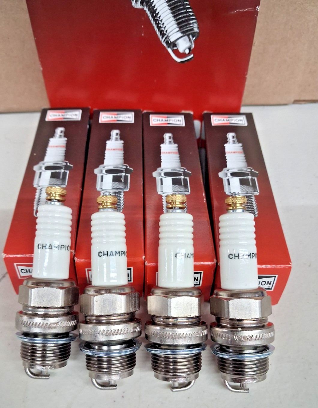 1928-34 Ford 4 Cylinder Model A B  Champion Replacement Spark Plugs W- Thumb Nut
