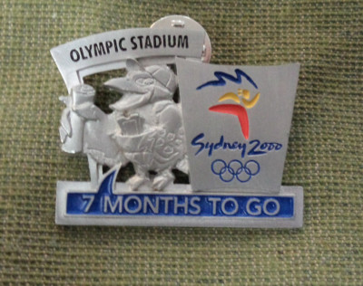#P325.  SYDNEY 2000 OLYMPIC COUNTDOWN PIN - 7 MONTHS TO GO