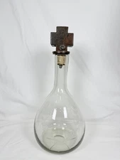 Jan Barboglio etched, glass decanter with 3 forged metal cross stopper