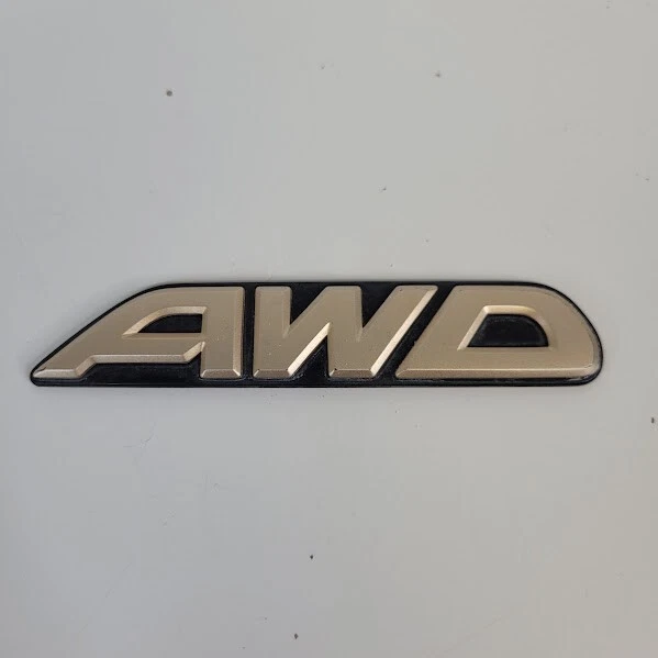 2000-2004 Subaru Outback Emblem Rear Hatch "AWD" Logo Gold OEM - Image 2 of 3