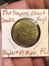 Advertisement Token - The Treasure Chest Smoke Shop - Naples & Ft Myers, Florida