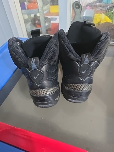 nike air bakin posite triple black