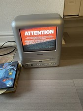 9 inch TV Vtg Daewoo DDQ-9H1SC TV/DVD Combo No remote Tested Works.