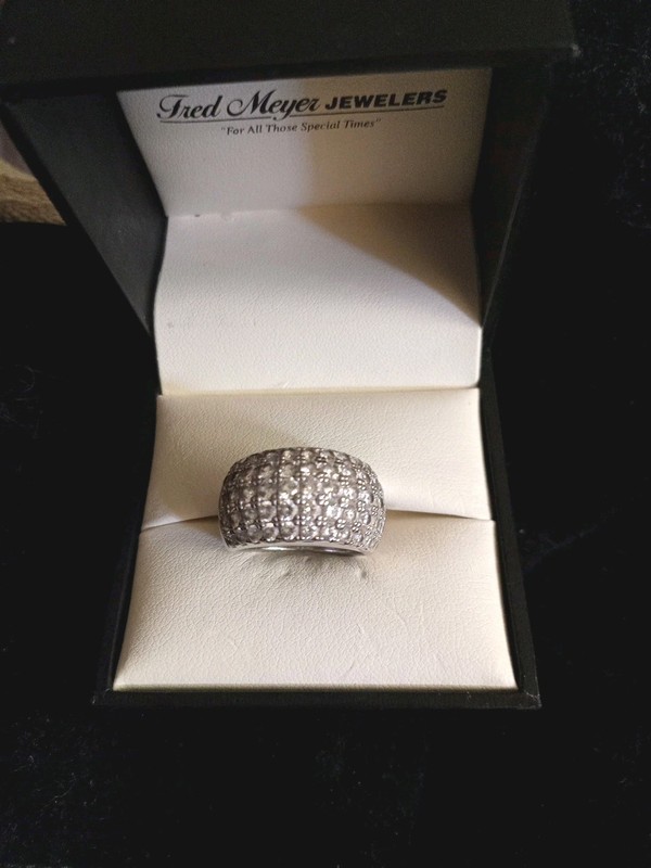 Pave SterlingSilver Ring with cubic zirconia stones. Size 7.5.Marked CZ925. 