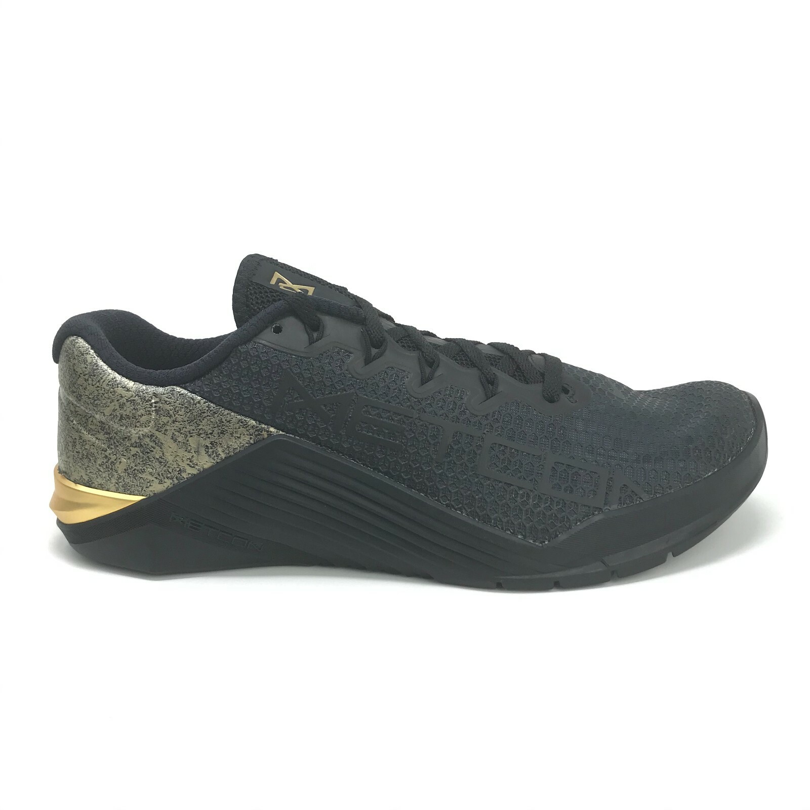 black and gold nike metcon