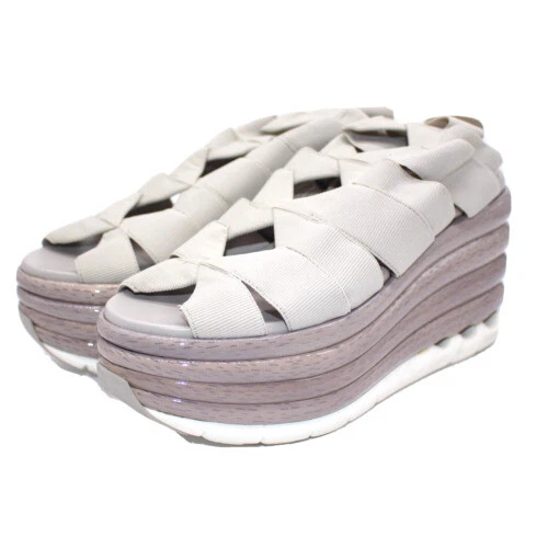 Кожаная верхняя одежда, обувь и аксессуары для женщин Salvatore Ferragamo на танкетке