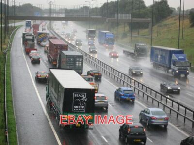 PHOTO  RUSH HOUR ON THE M62 LOOKING WEST FROM JUNCTION 19 THIS IS THE M62 DURING
