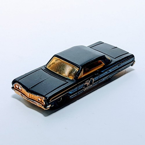 Hot Wheels flat black ’64 Impala, with Anniversary decoration along the side. It - Picture 5 of 5