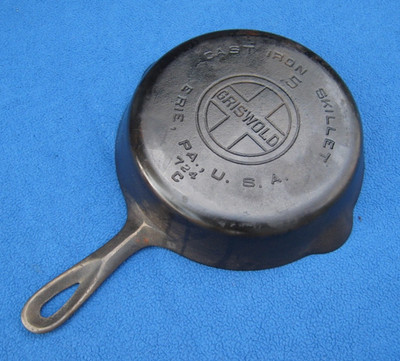 GRISWOLD LARGE BLOCK #5, 724C, SITS FLAT , VERY NICE.