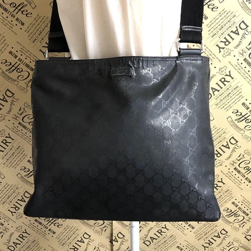 Borsa a tracolla Gucci GG Imprime PVC Messenger nera usata uomo