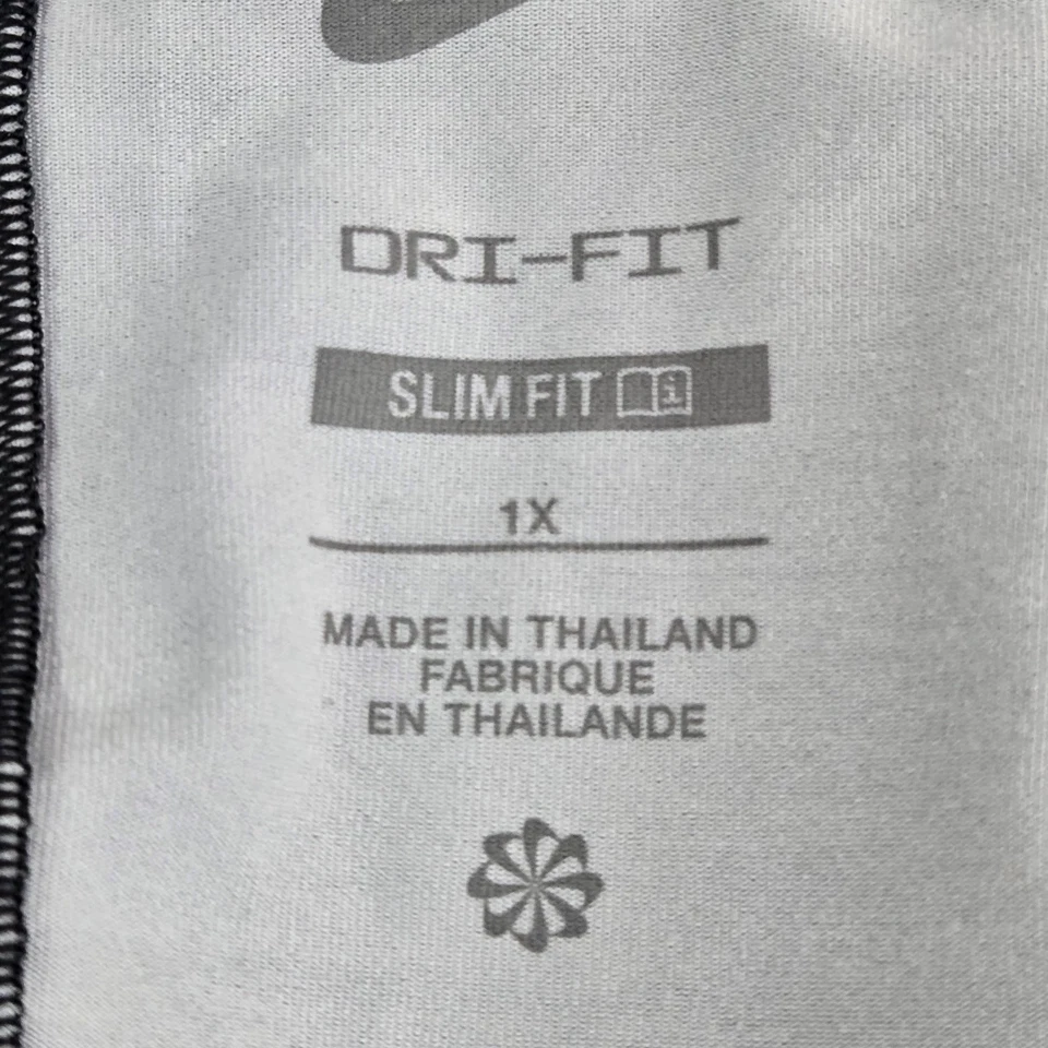 Camiseta sin mangas Nike para mujer 1X negra con estampado floral de hojas Dri Fit calce ajustado tropical Swoosh Foto 3 de 4