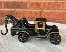 Vintage Cast Iron 5.5 Toy Tow Truck Black Gold Rolling Wheels Great Condition