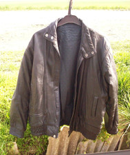 Black- Leather -jacket- Label -says -4- On -fabrique Au Maroc