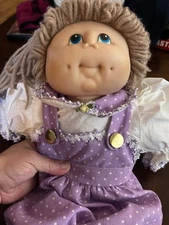 Vintage Cabbage Patch Doll with Blue Eyes and Pig Tails