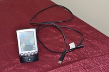 vintage Palm model 505 PDA with dock docking station