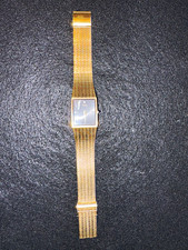 Pulsar Quartz man’s Dress Watch Rectangle Gold Bracelet Black Textured Dial