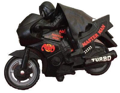 Vintage Black Turbo Master Motorcycle Toy Bike with Caped Hero Figure Loose